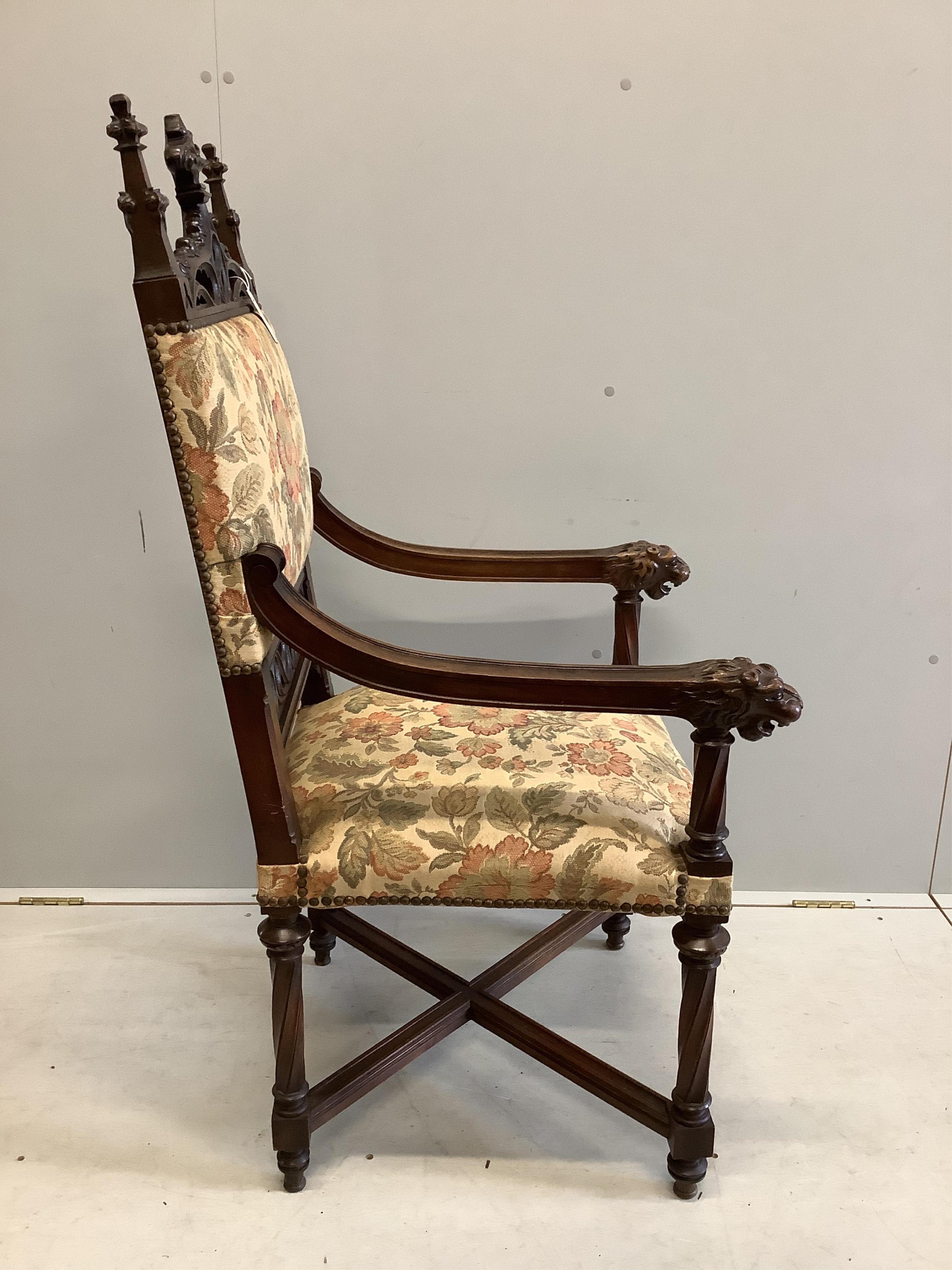 A neo-Gothic carved carved walnut chair, width 60cm, depth 60cm, height 122cm. Condition - fair to good